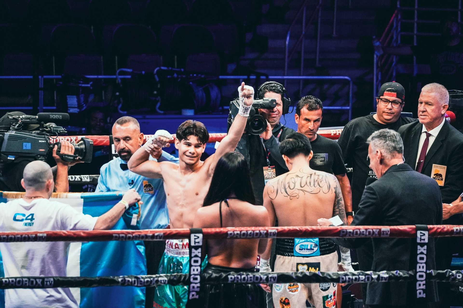Amador Mendez celebrating with arms raised